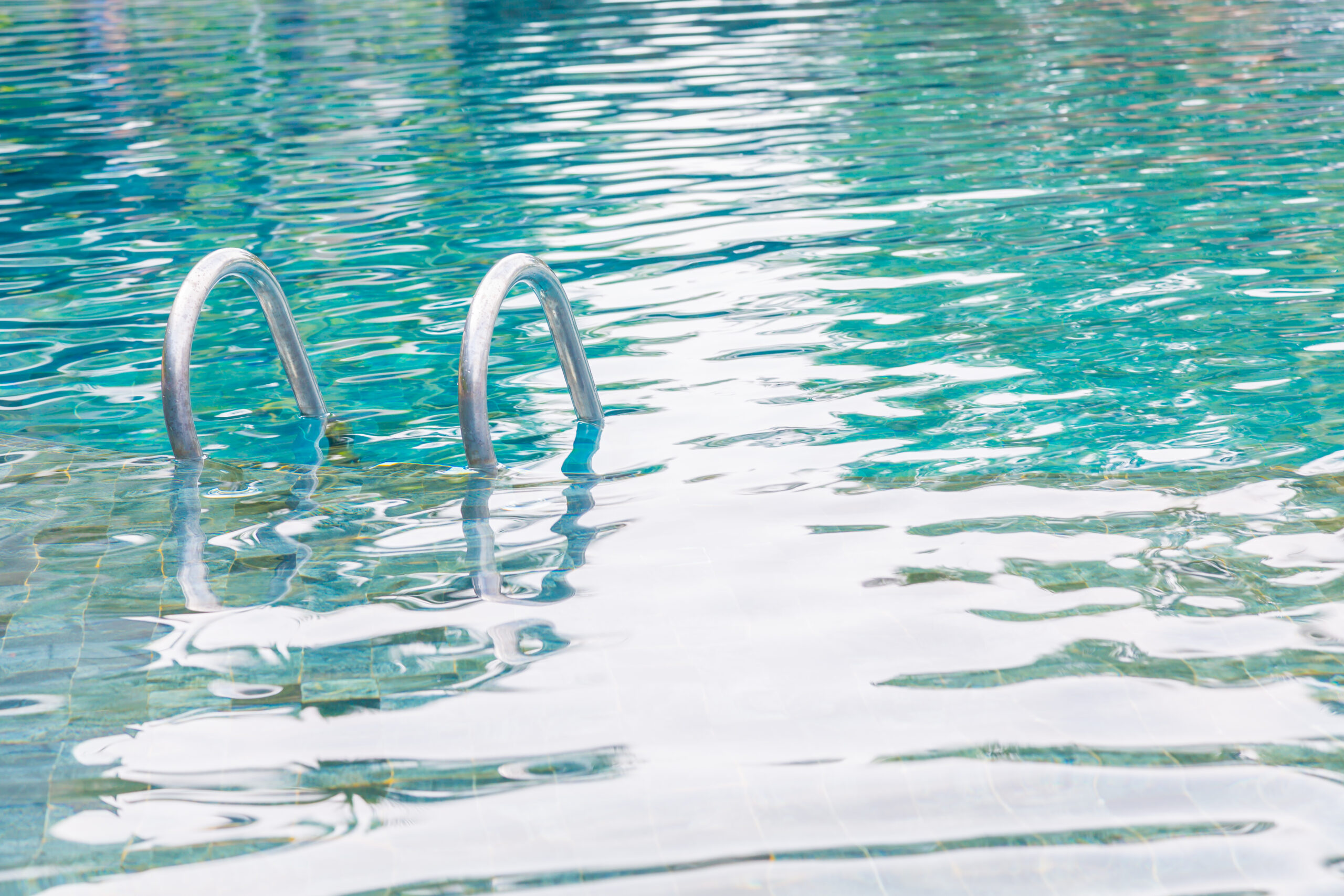 Clean above ground pool with ladder and steps after professional cleaning service